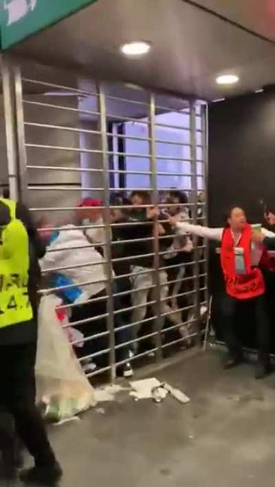 England fans forcing their way into Wembley stadium tonight.