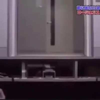 A gentleman lets a lady enter first