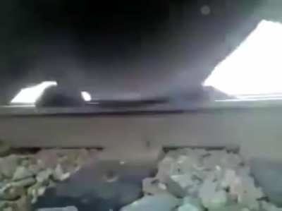 Guy Stuck Underneath Train
