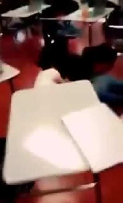 Classroom fight. Starts around 12-13 second mark