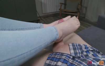 Making him shoot a big load with my tiny feet
