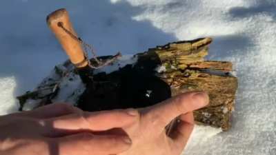 Making fire using ice. Credits Simple Woodsman.