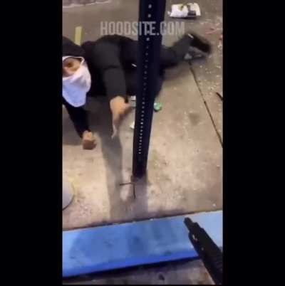 Asian store owner holds looter at gunpoint