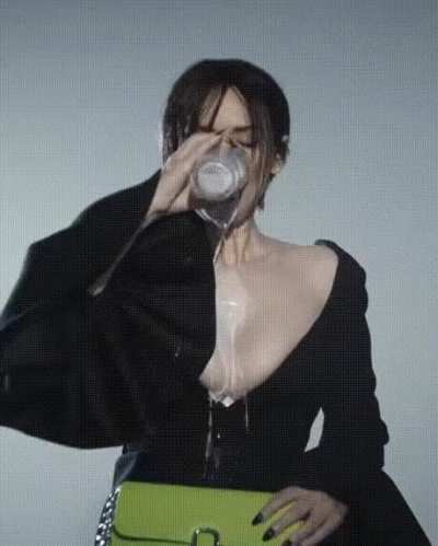 Winona Ryder spilling milk
