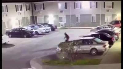 Surveillance video shows chaotic shootout at Portsmouth apartment complex ( voiceover)