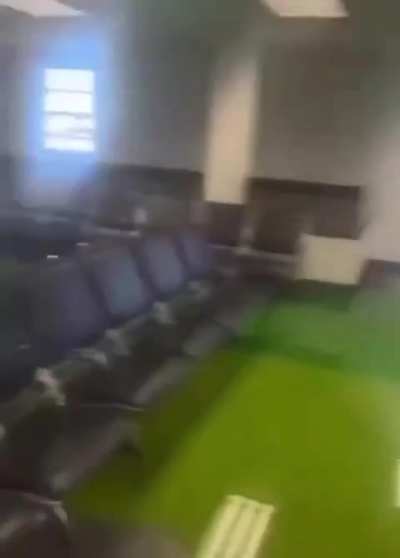 Passengers at Miami International Airport were surprised by a huge leak of a fluorescent green ooze