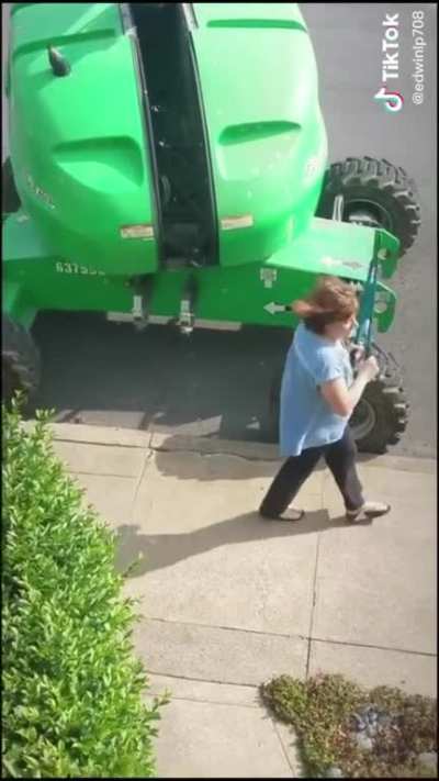 Trash woman vandalizing a lift