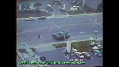 Stolen army tank leads police on pursuit through city streets.