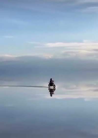 Salar De Uyuni is the world&rsquo;s largest salt flat, following rain a thin layer of calm water transforms the flat into the world largest mirror 80 miles across.