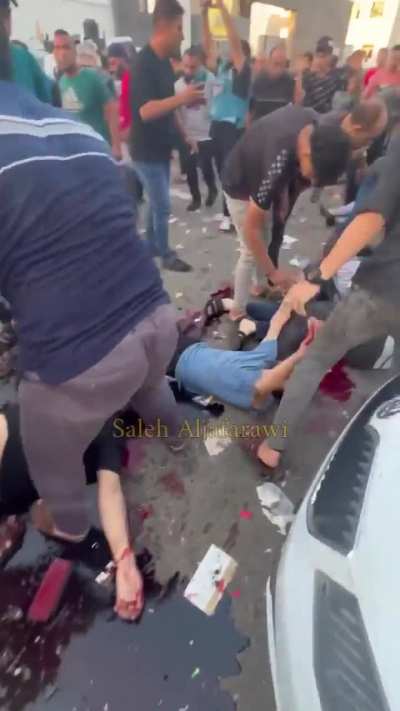 Video from aftermath of attack on ambulance convoy leaving Al-Shifa Hospital towards Rafah Crossing. NSFW