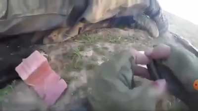 Seems like the request for this video is normal. I've only seen the gif on this platform though. So here's the video of the I.S fighter retreating and catching a round through his lung. His comrade watches him fall and die all while using his dying mate a