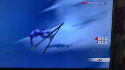 Skiier falls, bounces, stays upright