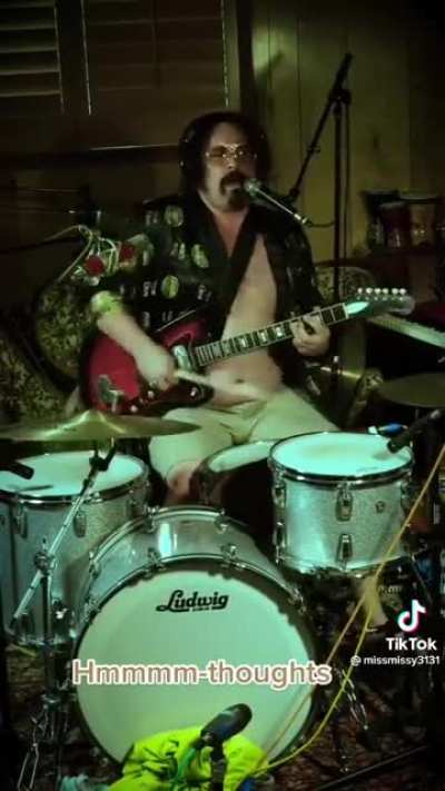 Playing drums and guitar and singing all at once