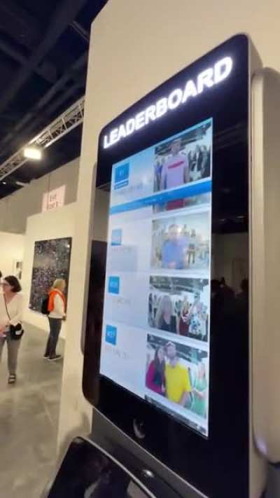 This is an ATM at Art Basel that puts your bank account balance &amp;amp; photo on a leaderboard for all to see