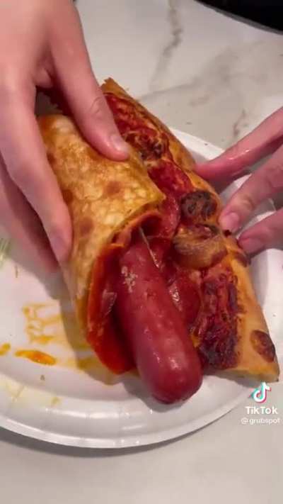 Is-is that a hotdog wrapped in pizza&hellip;? Why? Why would you do it?