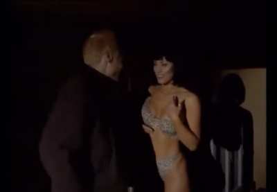 Kiara Hunter in a Bikini Grabs a Man by the Balls in Sleeping Dogs (1997)