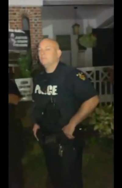 Protester tells police officer guarding Troy, NY mayor's home that his face is "passive-aggressive"