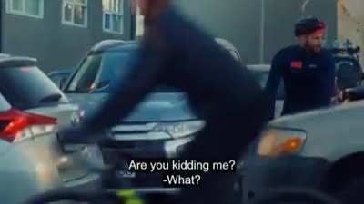 Are you kidding me? A man on a bike! Get yourself a car!