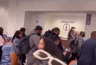 Busta Rhymes throws his drink at woman for slapping his ass