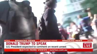 The Australian channel broadcasting live in front of the White House punched cameraman by police. Broadcast was interrupted.