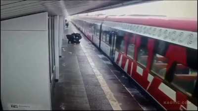 Boxing with friends on a railway platform