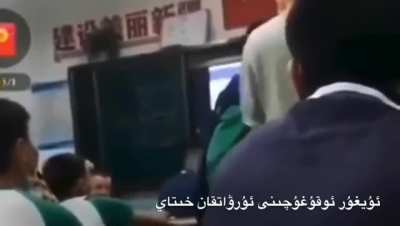 Teacher in Xinjiang school slaps a Uyghur student for 11 times, even pulling his mask off