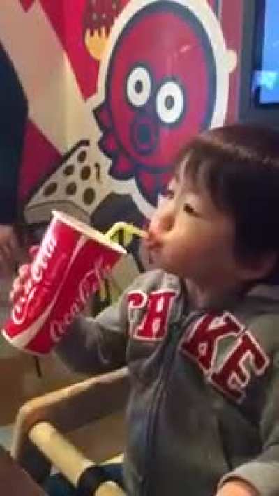 Enjoying a nice cold cup of soda........