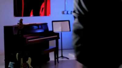 Kirby plays the piano