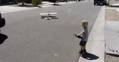 The boy seems super excited to begin his flying lessons with his awesome plane that ACTUALLY FLIES! Wait- wait NO---