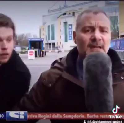Guy holding a fake banana, harasses a Reporter while being live on TV.