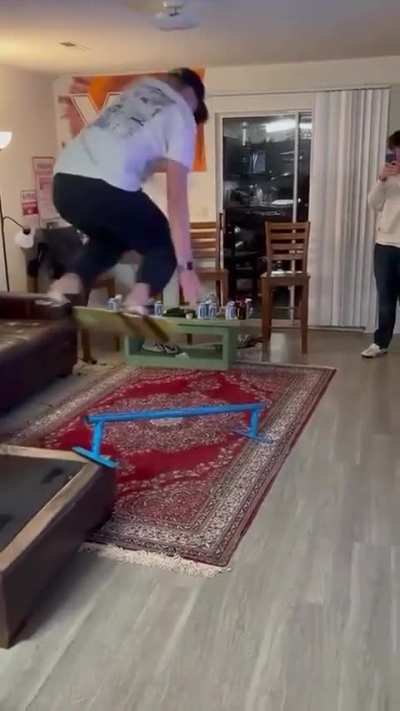 improvised skateboarding in living room