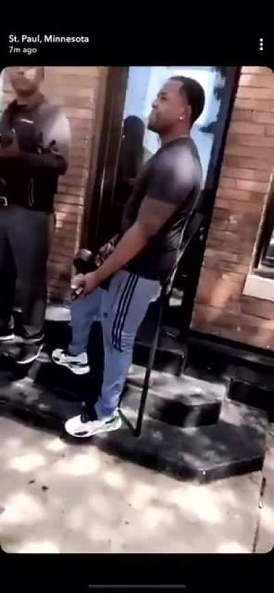 Black business owners protecting their store from looters in St. Paul, Minnesota