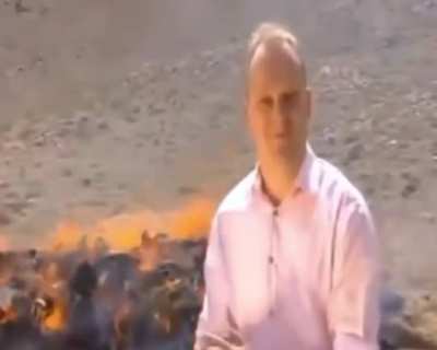 Reporting on authorities burning drugs while standing close