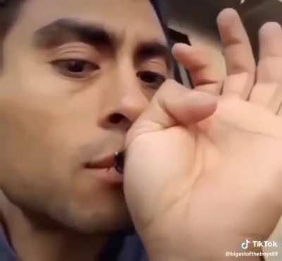 Martin Cabello getting stung by a bee he saved