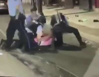 The cop literally put that man's hand on the stick just so he could have a reason to beat him up
