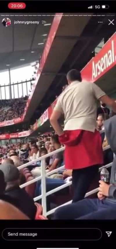 Fan has a go at Edu at the Arsenal Chelsea game. Edu&rsquo;s wife gives him the middle finger