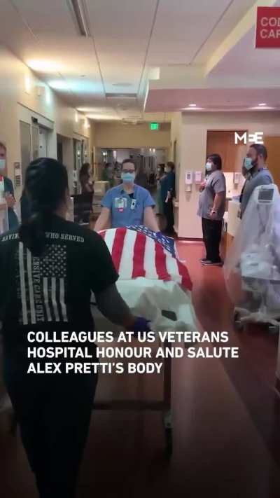 Colleagues at a US veterans hospital honour salute the body of Alex Pretti
