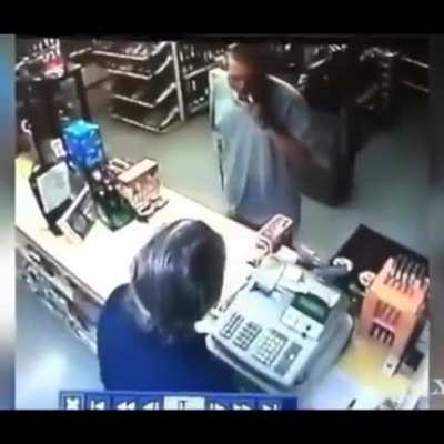 To rob the cashier.