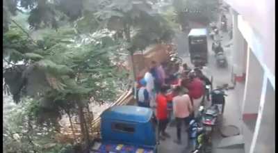 Woman falls down an uncovered manhole - Patna, India