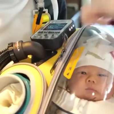 This father creates -Death Stranding- suit to protect his baby from coronavirus.