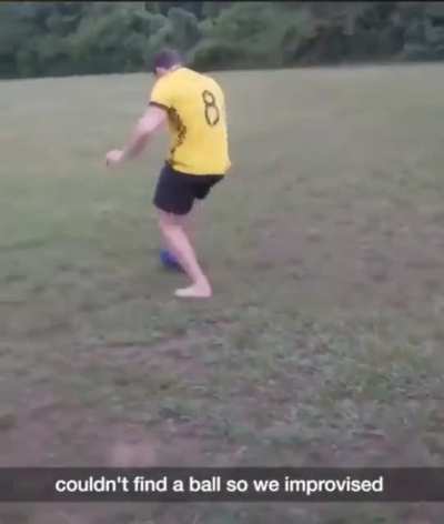 Playing football with a bowling ball
