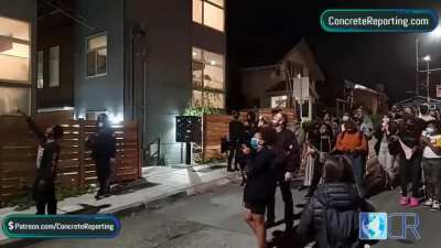 Protesters in Seattle demand that white people give up their houses