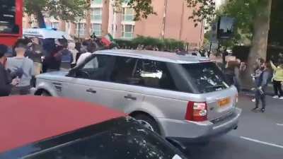 Protest against Islamic government in London. The guy getting attacked is a supporter of the government.