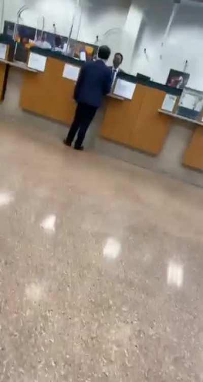 guy in a suit freaks out because he didn&rsquo;t like the way the lady at the bank window said &ldquo;how can i help you&rdquo;