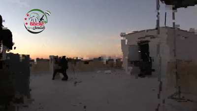 Northern Storm Brigade fighters trade long bursts of fire with Syrian Army outside of Menagh Military Airbase - 12/29/2012