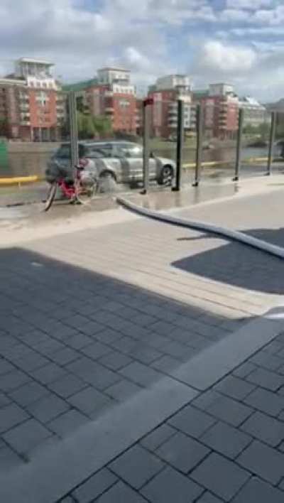 Skateboarder thinks it&rsquo;s a good idea to ride over a hose pipe