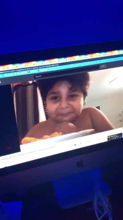 Perfectly cut laugh? (The kid was eating a Hot Cheeto)