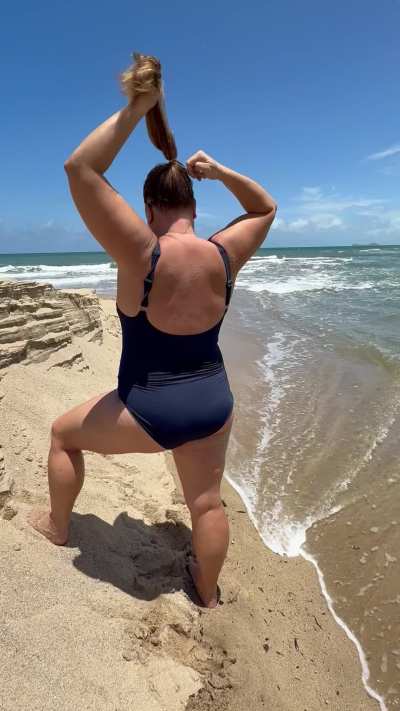 Tying my ponytail on a windy day. 