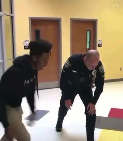 Student challenges cop to race