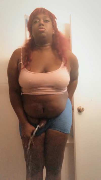Ebony Latina transsexual sprays pee everywhere 